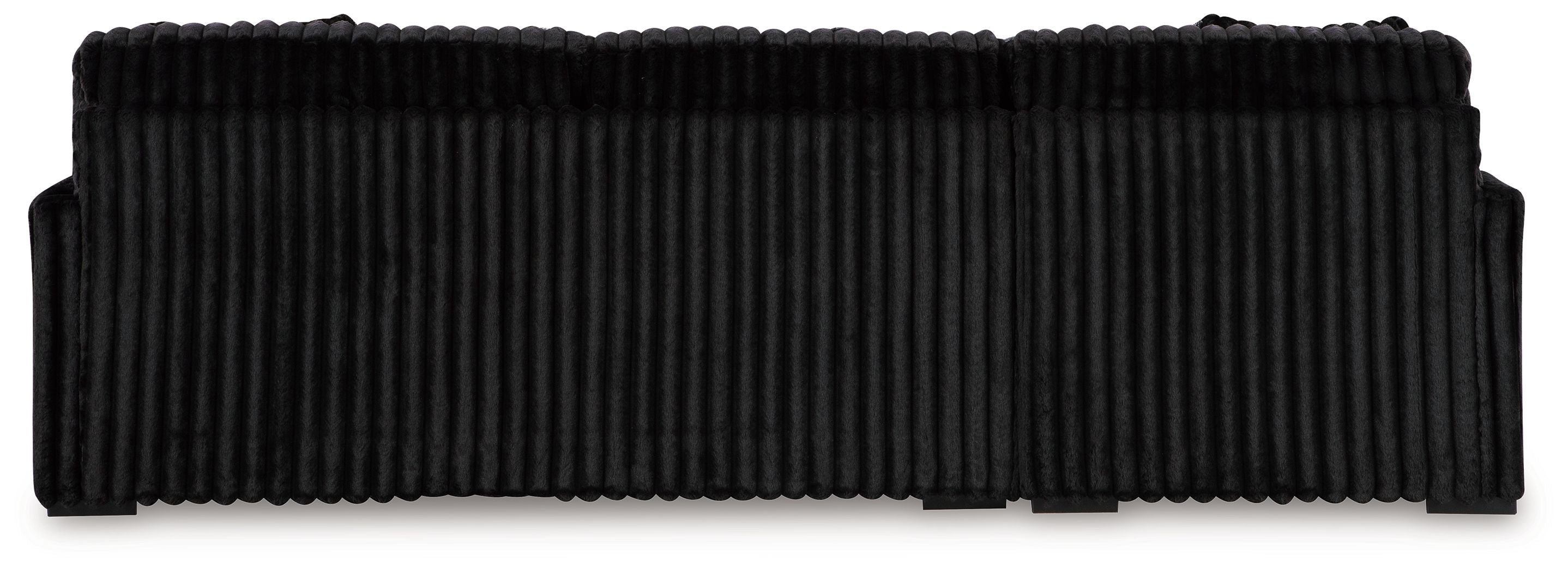 Black corduroy sectional sofa with ribbed back cushions and straight base