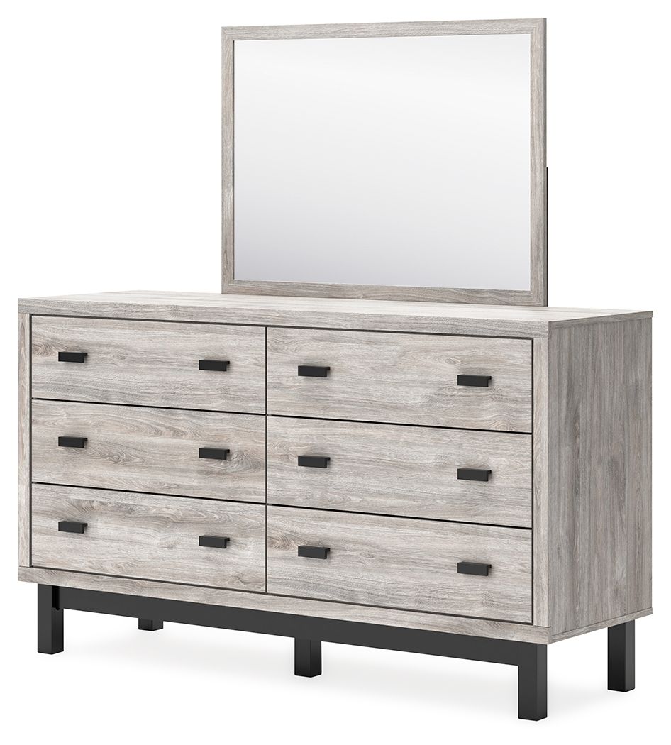 Gray dresser with mirror, six drawers with black bar pulls, sturdy wooden legs