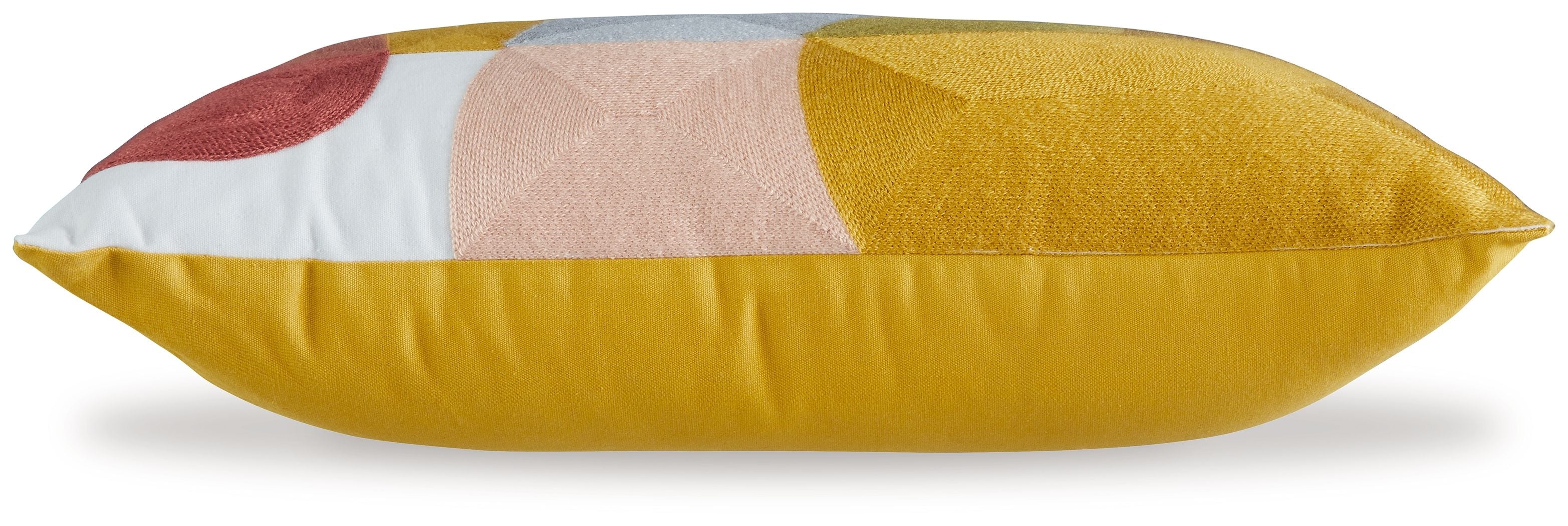 Yellow back pillow with rust and white geometric corner
