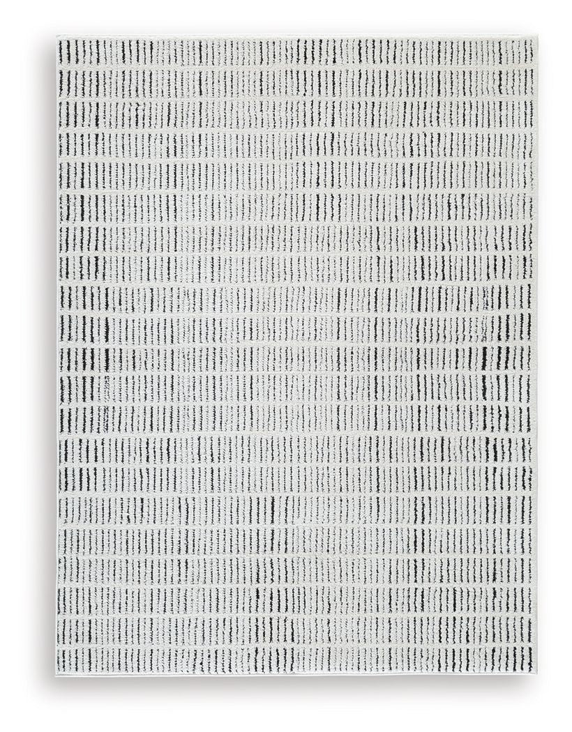 Turinwith rug, beige ground with evenly spaced dark line pattern