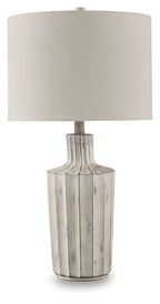 Imre poly table lamp with beige shade and distressed gray base