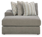 Ash gray corner chaise sofa, front view with two patterned throw pillows