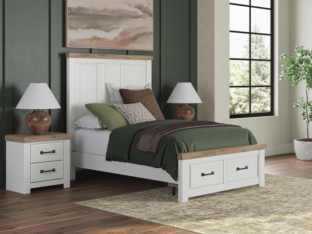 White panel storage bed with underbed drawers and footboard platform, paneled sides