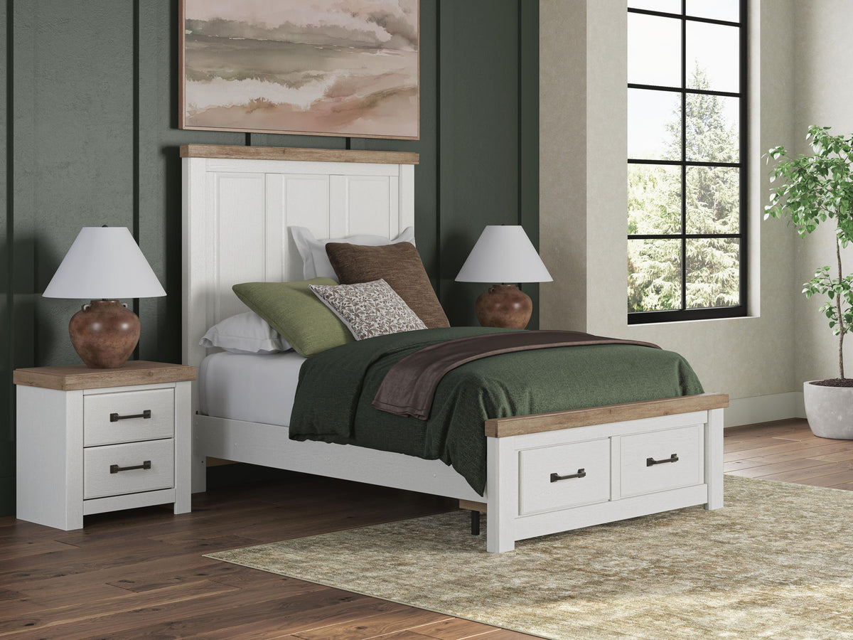 White panel storage bed with underbed drawers and footboard platform, paneled sides