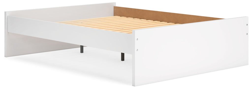 White platform bed with open slat base and underside storage compartment