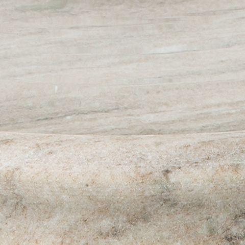 Light stone base surface for a glass cylinder candle holder