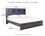 Panel bookcase bed with dark wood frame, white mattress, and blue-lit shelf panels