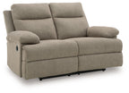 Beige reclining sofa with rounded arms, split back cushions, and low black base feet