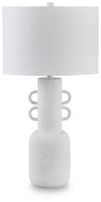 Distressed white metal table lamp with drum shade and textured pedestal base