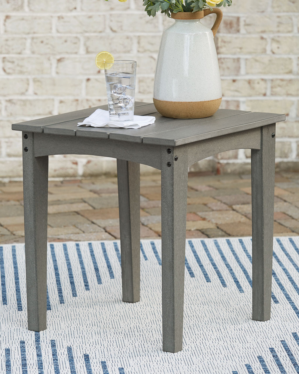 Gray square end table with flat tabletop and four sturdy legs