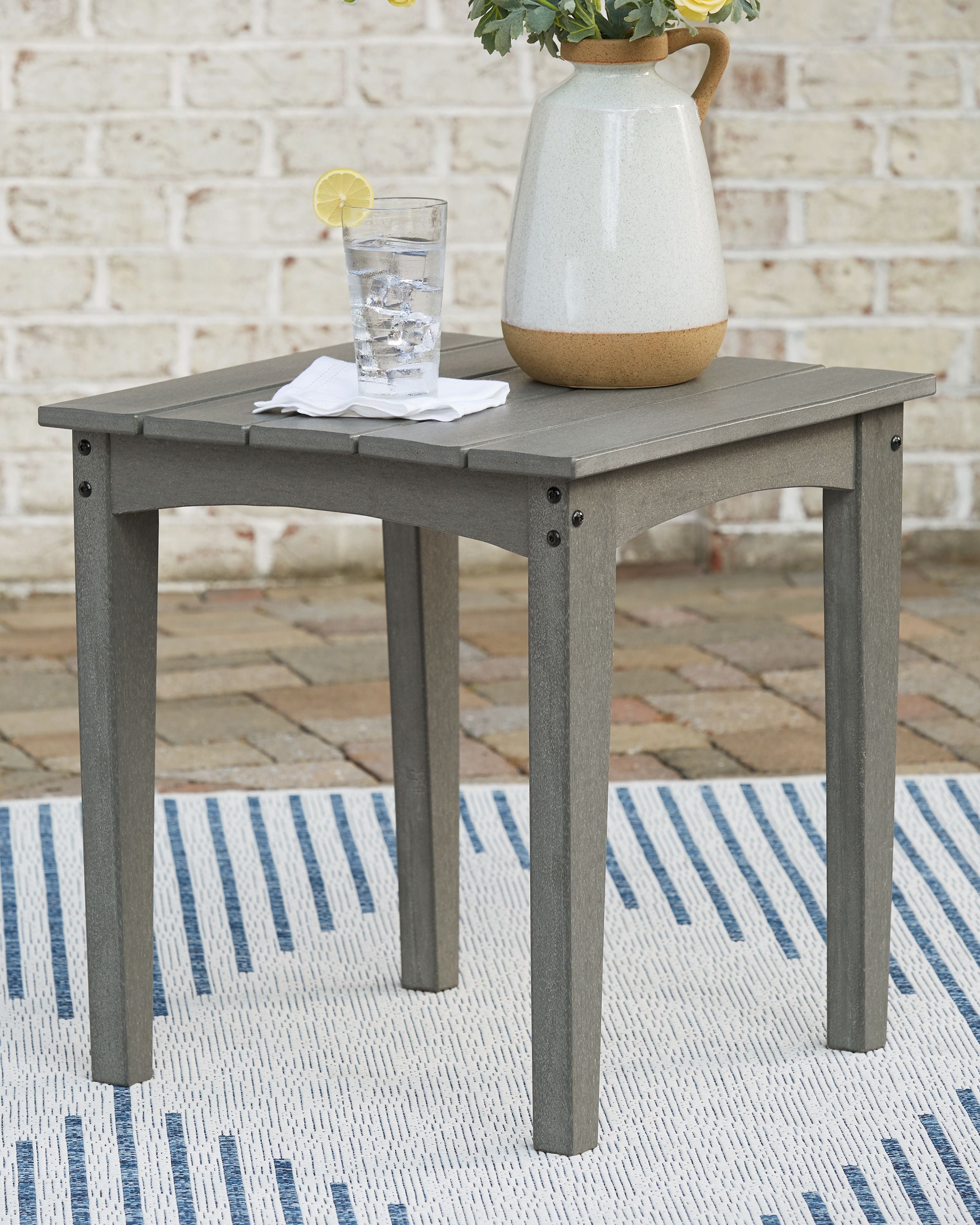 Gray square end table with flat tabletop and four sturdy legs