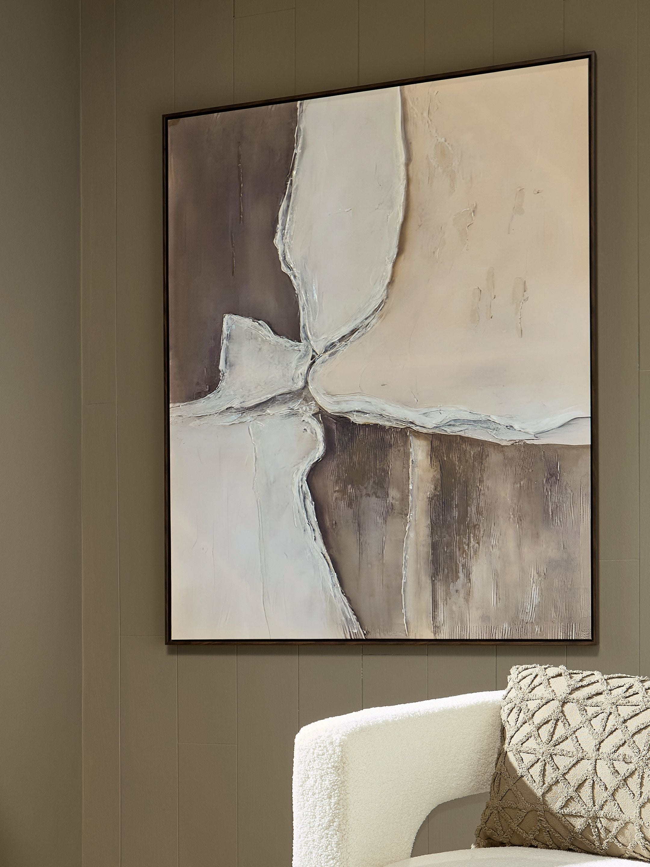 Junward framed wall art showing layered white and grayish-tan abstract forms