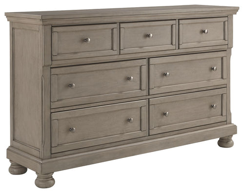Lettner light gray dresser with multiple drawers and round metal knobs