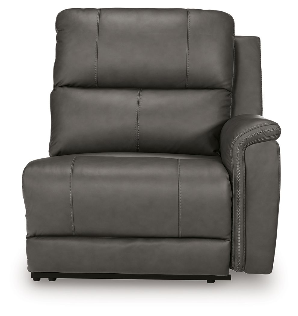 Power wall recliner chair in dark gray with thick seat cushions and side arm panels