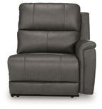 Power wall recliner chair in dark gray with thick seat cushions and side arm panels