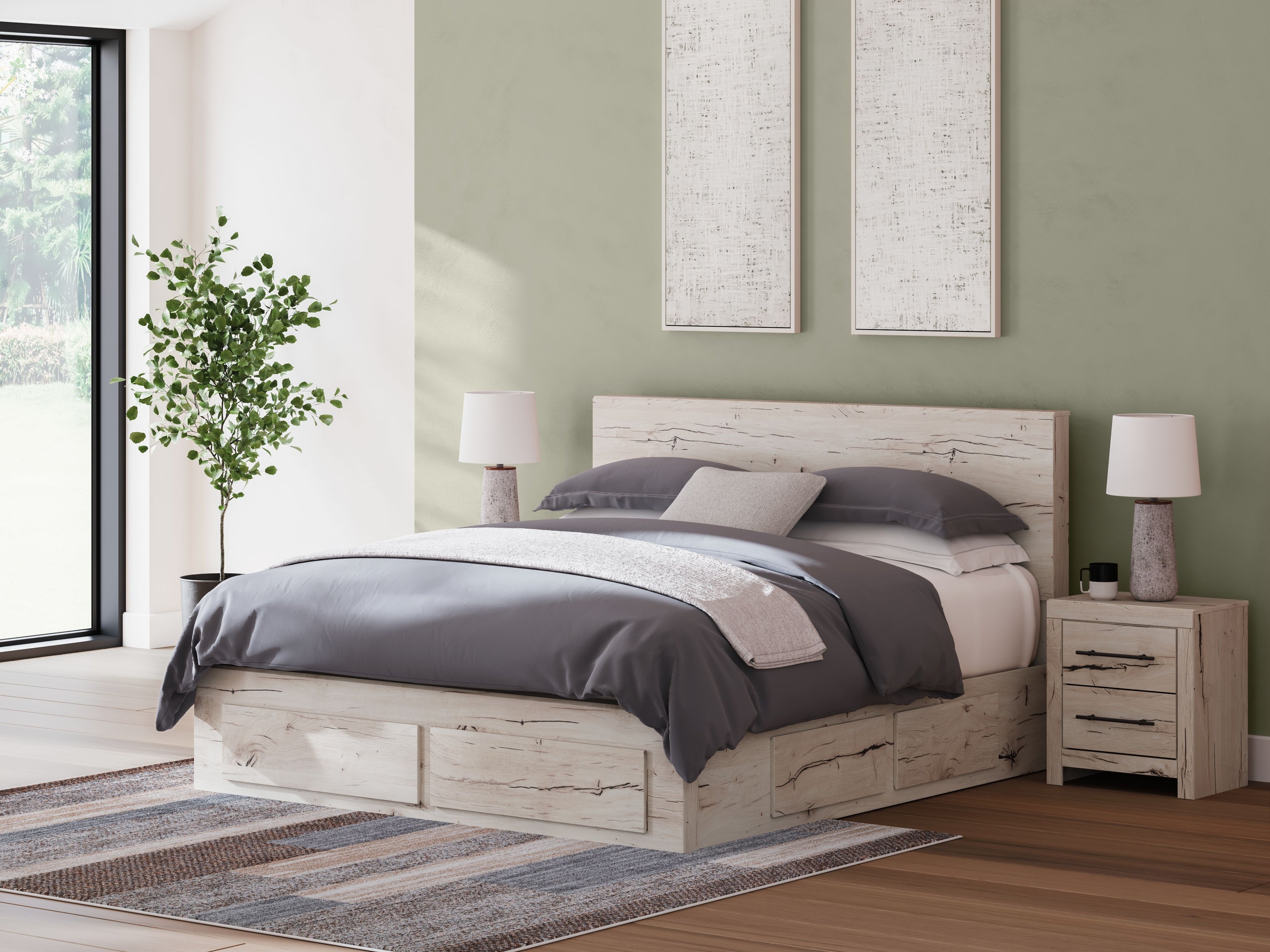 Light wood panel bed with storage drawers, gray duvet and two throw pillows
