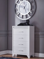 White four-drawer chest with metal bar handles and decorative textured top
