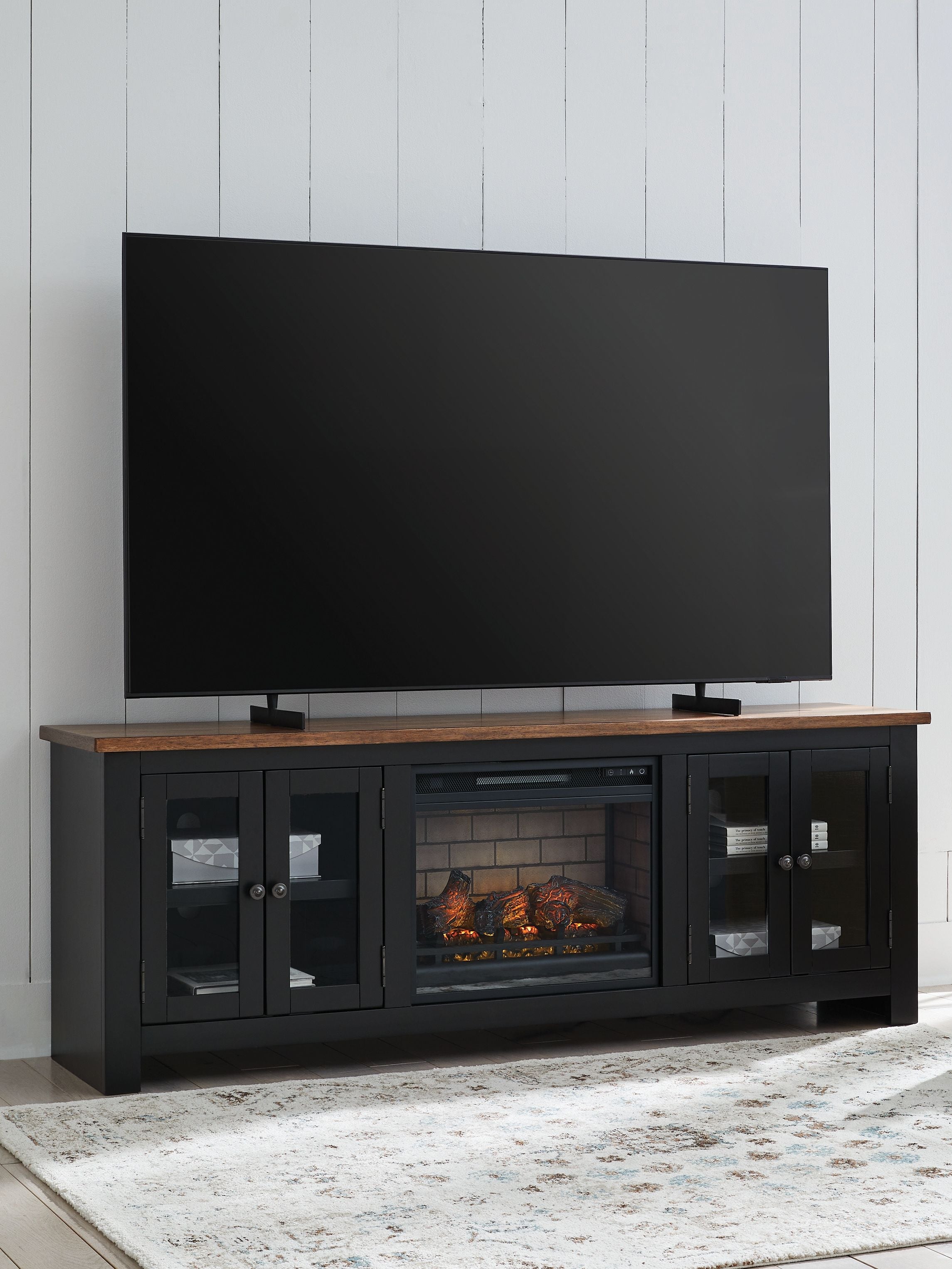 Black TV stand with electric fireplace, faux crystals insert, four-door storage