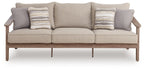 Sofa with cushions in natural beige with three striped throw pillows and two gray arms