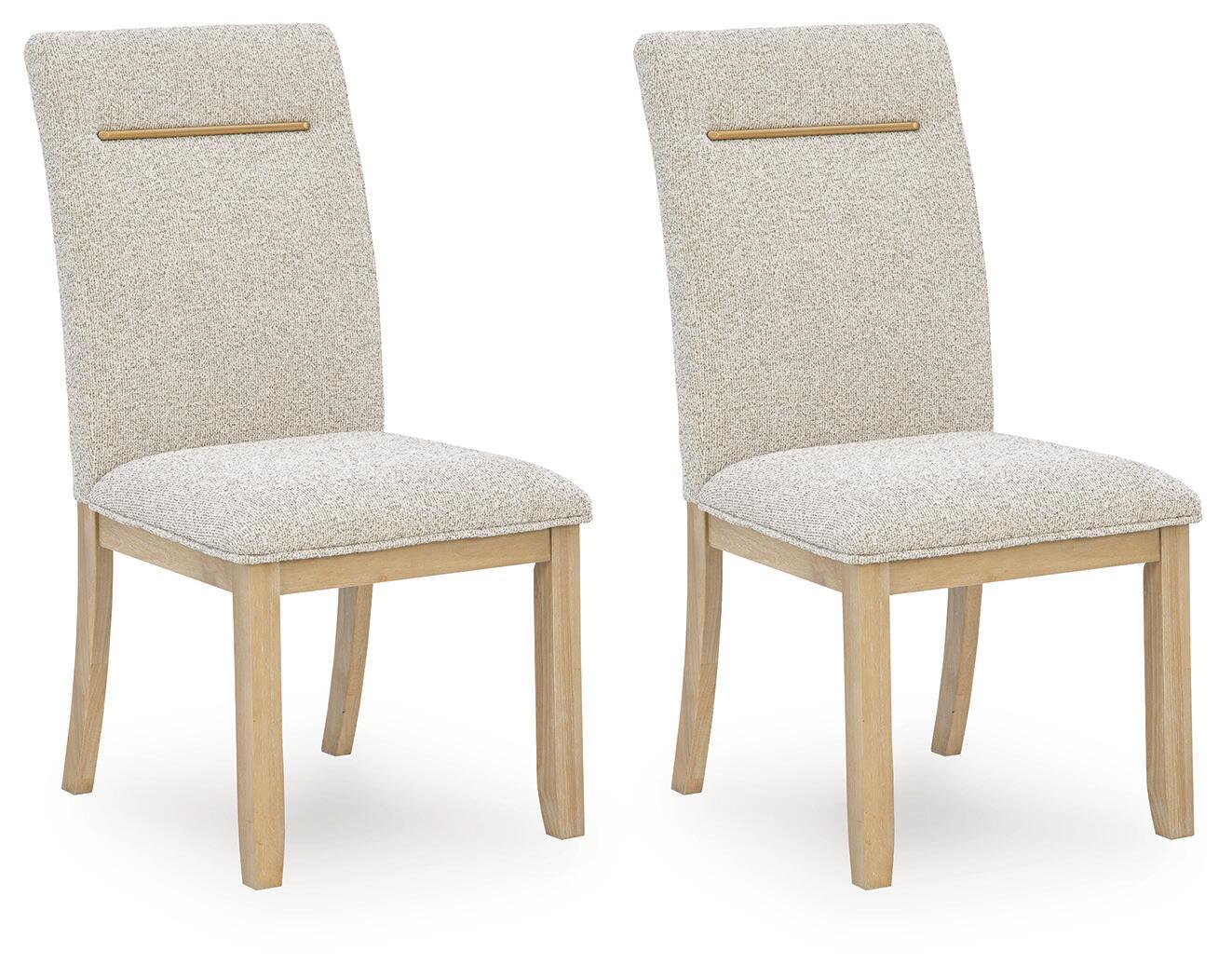Light beige upholstered dining side chair with wooden legs and gold bar handle