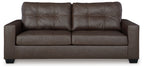 Brown sofa sleeper front view with tufted back cushions, two-seat bench, track arms.
