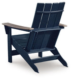 Adirondack chair angled view with dark navy slatted back, beige armrests, wide seat