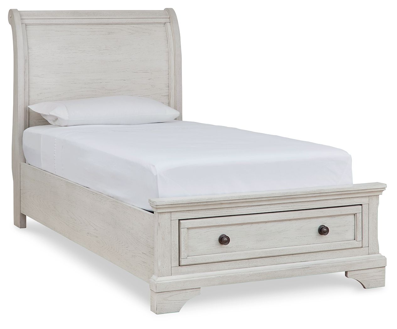White sleigh bed with two storage drawers in the footboard and paneled headboard.