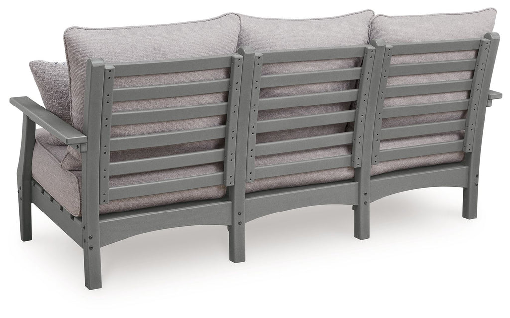 Gray outdoor sofa with back cushions and slatted gray frame