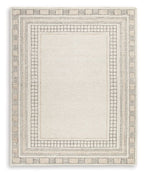 Beige area rug with square medallion and lattice border pattern