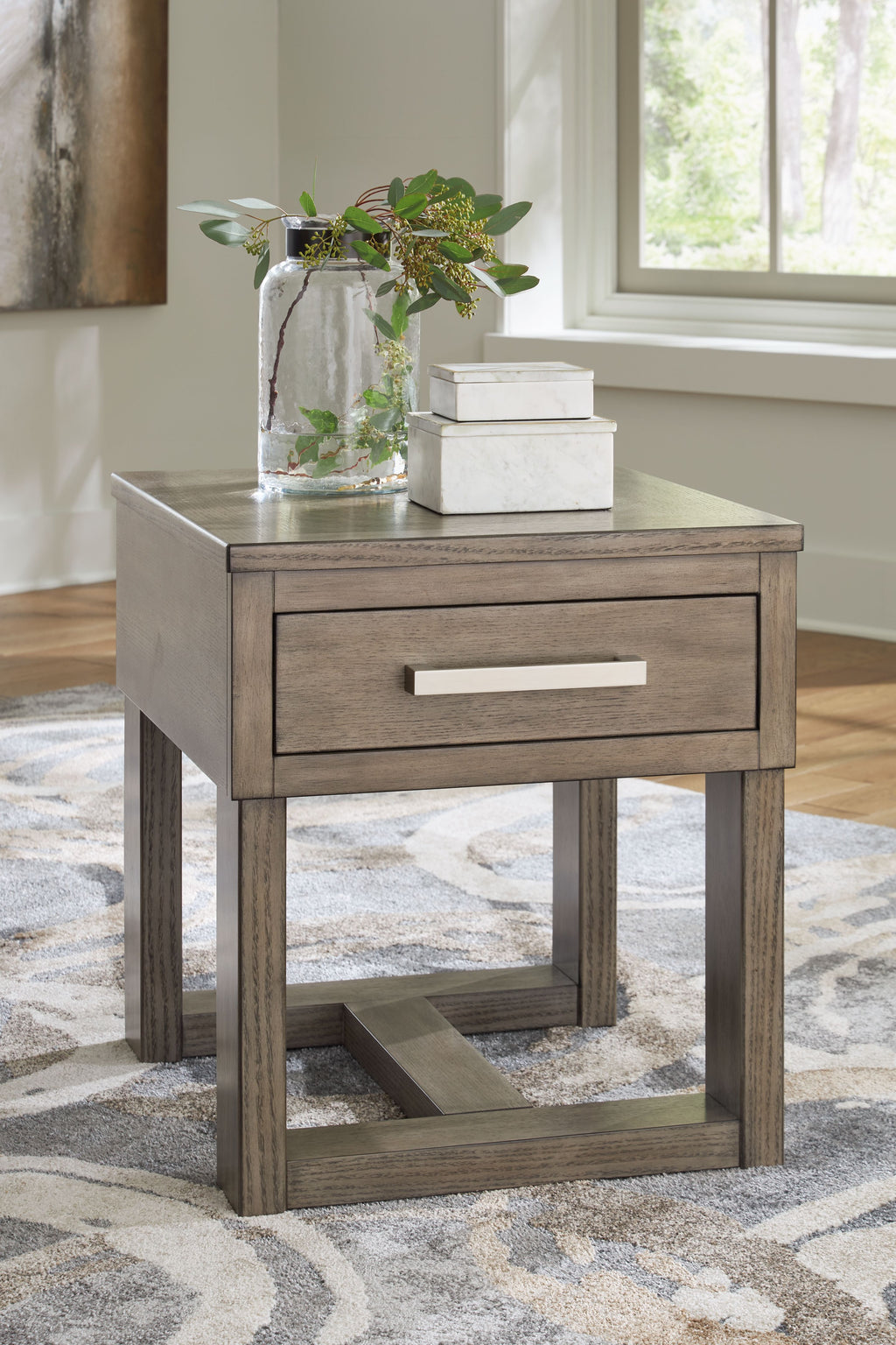 Grayish brown rectangular end table with drawer and open lower shelf