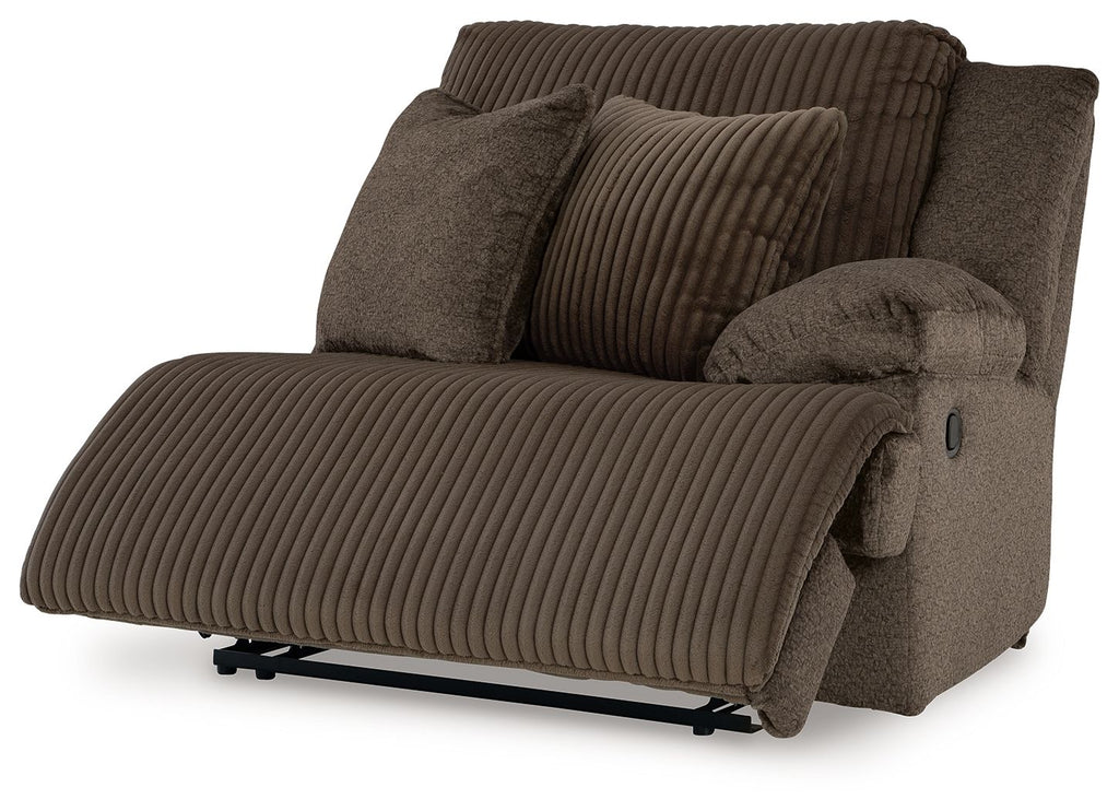 Chocolate-brown fabric zero-wall recliner with padded arm and ribbed backrest