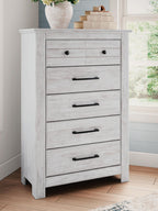 White five-drawer chest with black bar pulls and wide top drawer