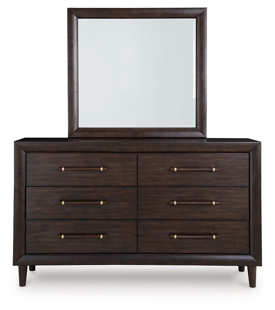 Dark brown dresser with mirror, six drawers and brass bar handles