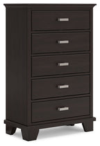 Five-drawer chest in dark brown wood with silver bar handles and tapered legs