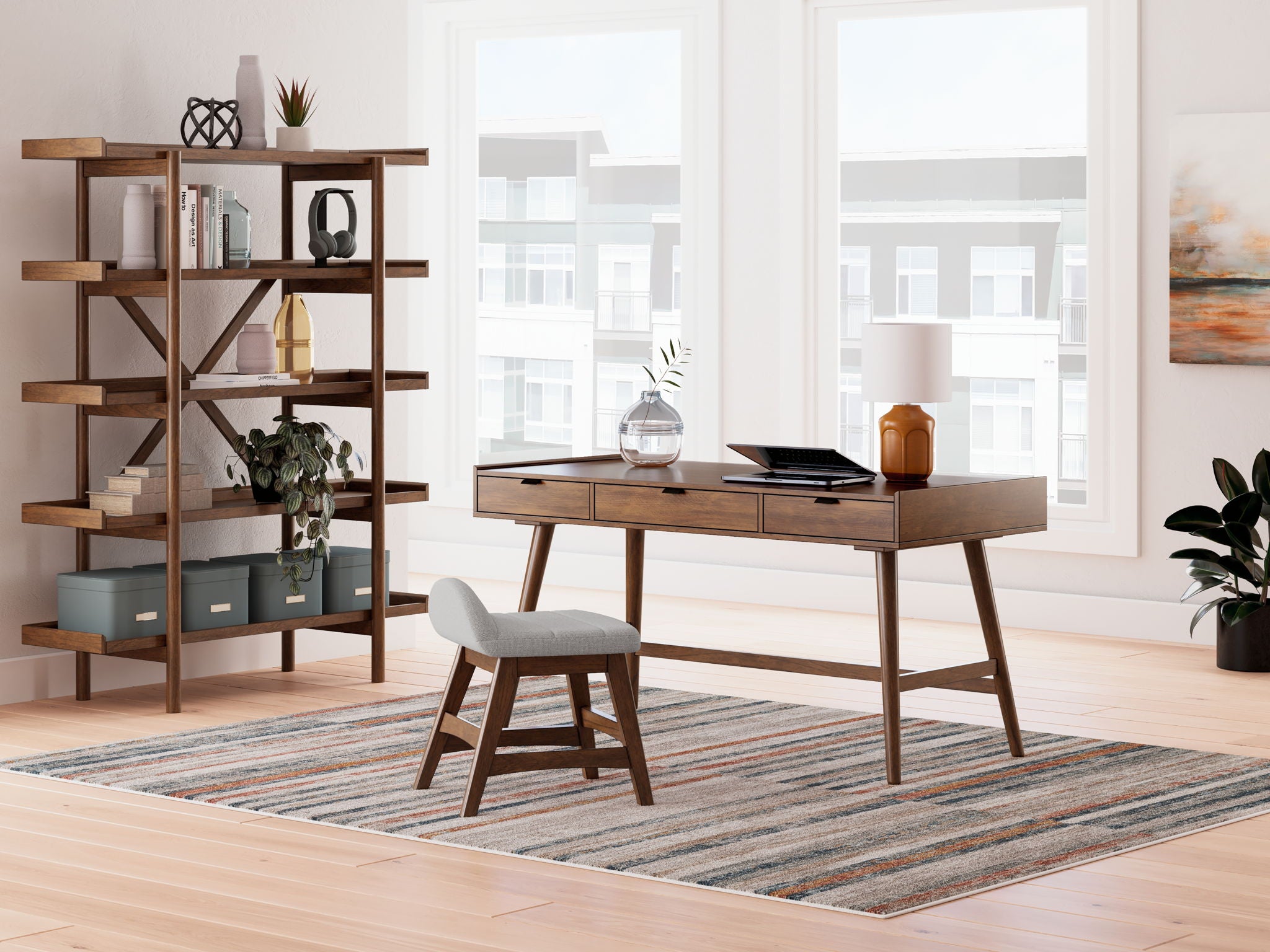3-piece home office set with brown desk, matching chair, and bookcase shelving