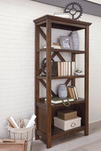 Rustic brown large bookcase with X-legs and open cubby shelves
