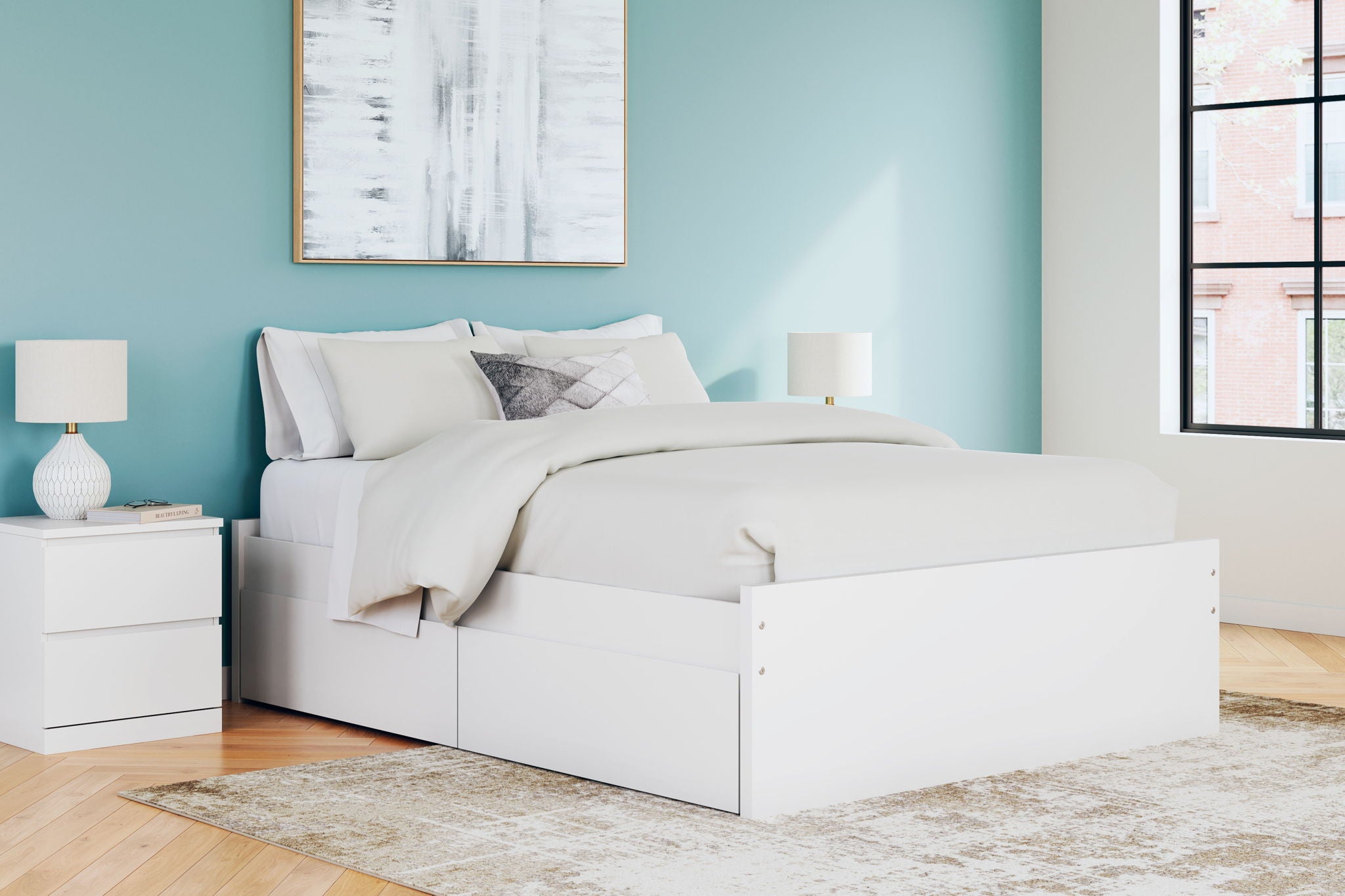 White platform bed with drawers, upholstered headboard, and white bedding