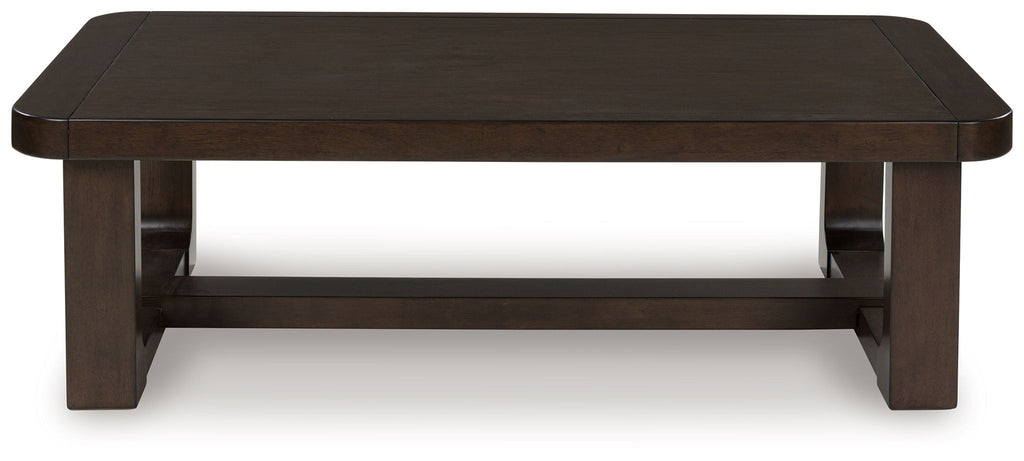 Dark brown rectangular cocktail table with open bottom shelf and straight legs