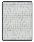White quilted mattress surface with stitched grid pattern and gray edging