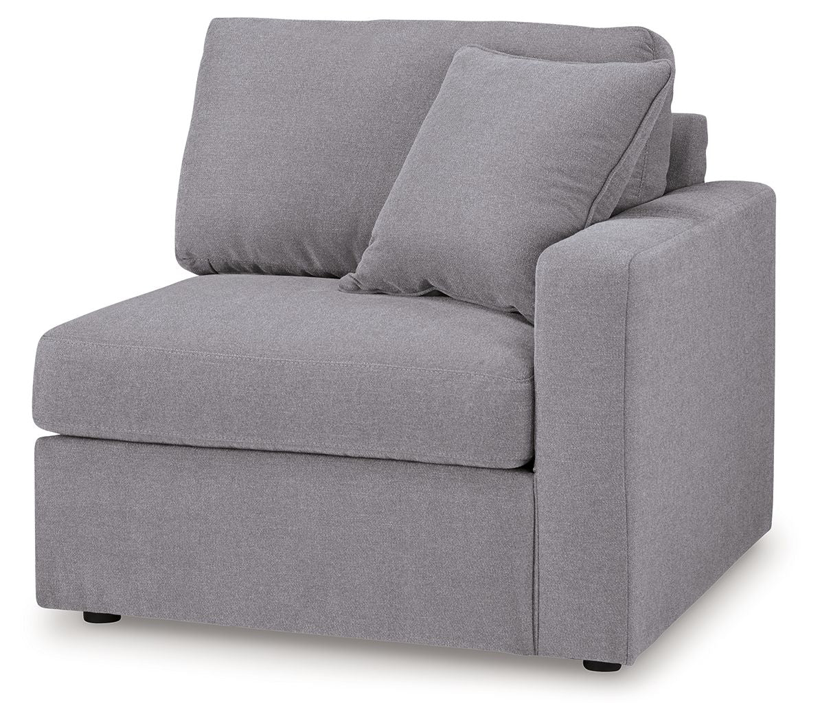 Heather gray upholstered corner chair with thick back cushions and squared right arm