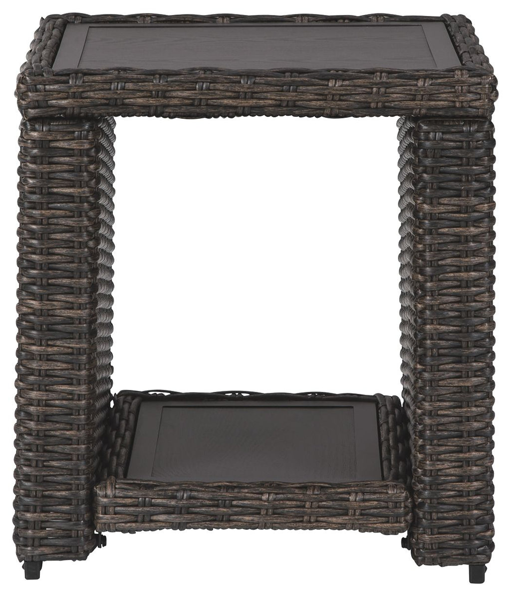 Woven square side table with four legs and open lower shelf