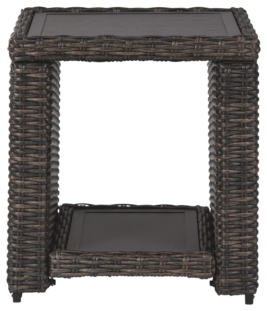 Woven square side table with four legs and open lower shelf