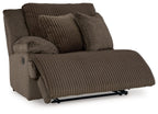 Chocolate recliner in side view with ribbed cushion seat and supportive armrest