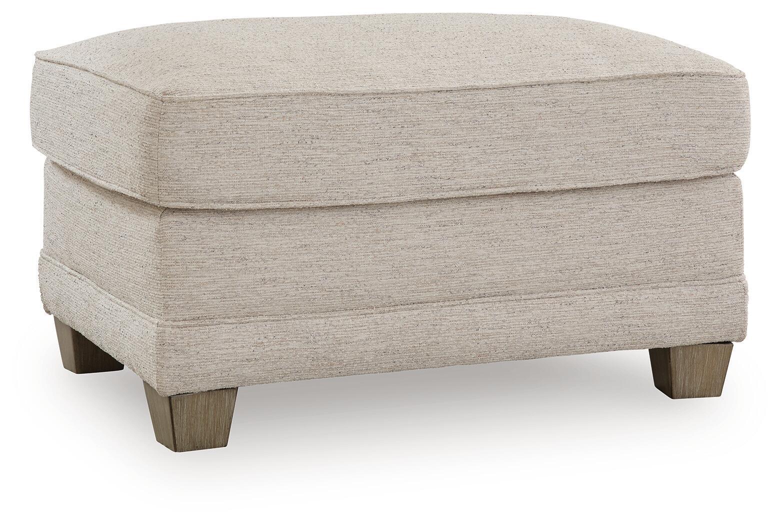 Tufted opal fabric ottoman with hinged lid and dark wood legs