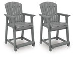 Two dark gray wooden barstools with slatted backs, armrests, and footrests.