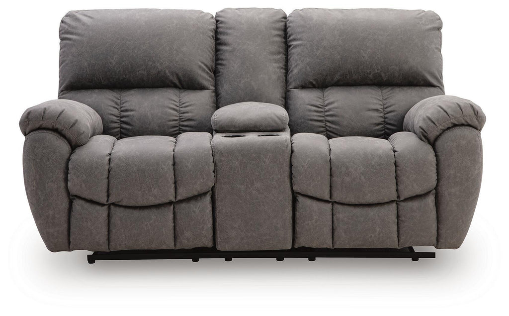 Dark gray power recline loveseat with quilted seat cushions and padded headrests