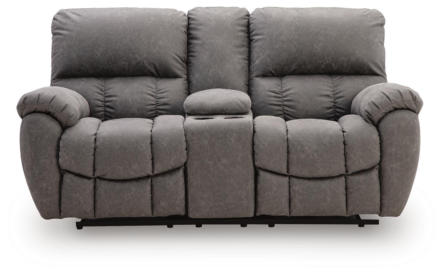 Dark gray power recline loveseat with quilted seat cushions and padded headrests