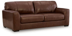 Brown leather sofa with rolled arms and three back cushions