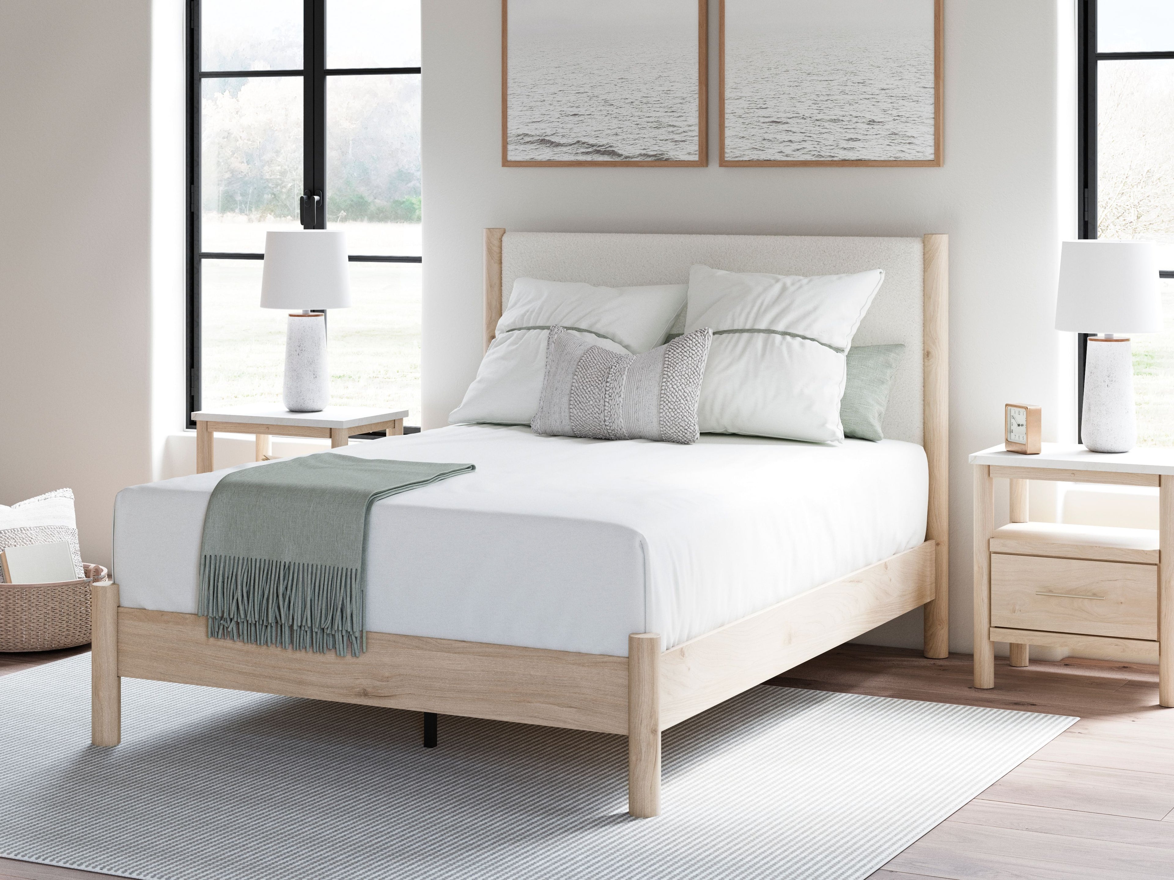 Upholstered panel bed with beige headboard, light wood frame, white mattress