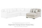 White sectional sofa with right-arm facing corner chaise extension and cushions
